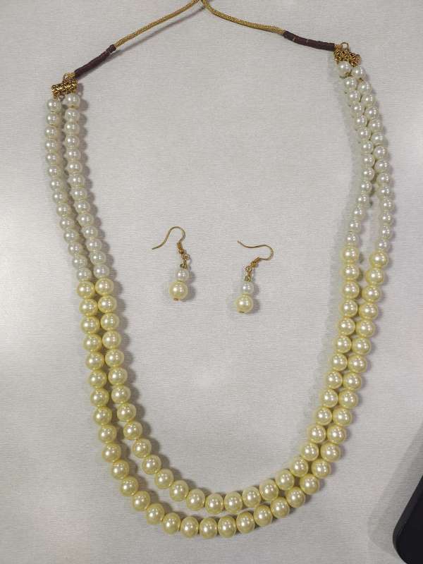 urja mahila bachat gat - White and off white pearl set