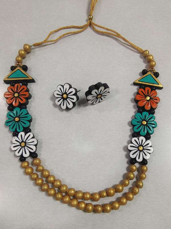 urja mahila bachat gat flower orange green and white type of the set scaled e1752040136501