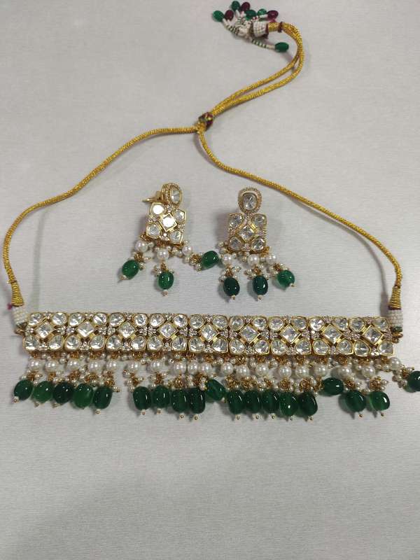 urja mahila bachat gat green square flower type and idiamond type earring with golder color thread in it scaled